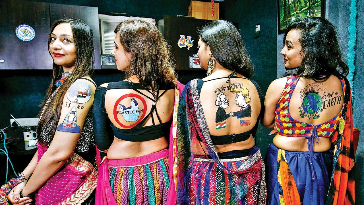 Image of Navratri (Ladies dressed in traditional outfits)